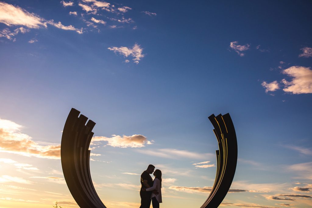Silhouette of a couple in the 217.5 Arc X 13 by Bernar Venet