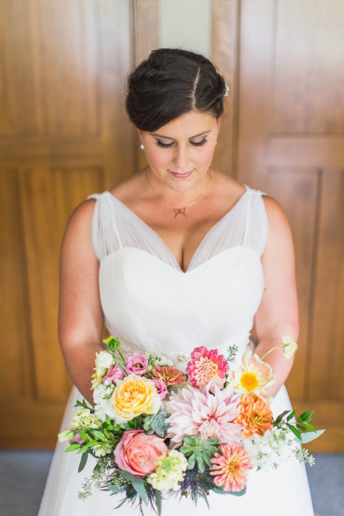 Bride with bouquet from Wild Rabbit Flowers
